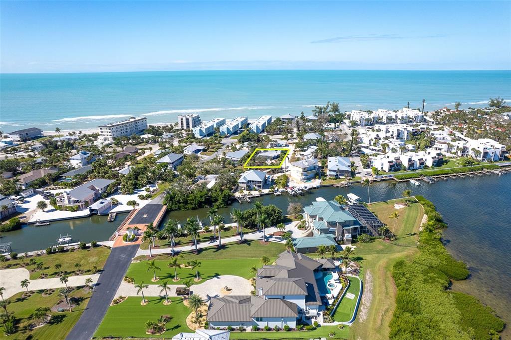 2835 North Beach Road, Unit A Englewood, FL 34223 - Photo 53 of 58 an aerial view of a houses with outdoor space
