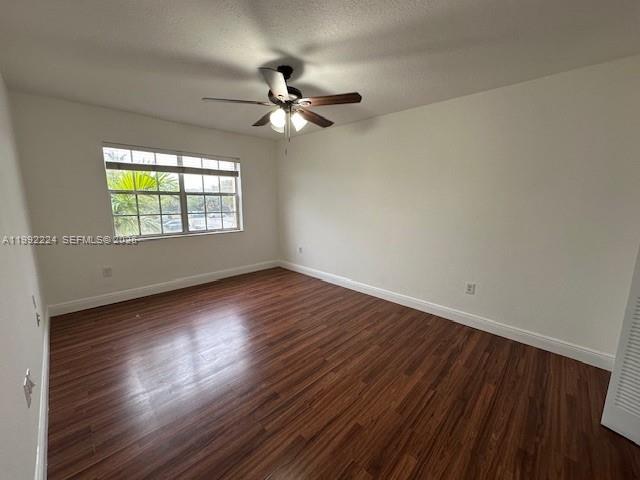 5400 Southwest 77th Court, Unit 2R Miami, FL 33155 - Photo 11 of 16 wooden floor in an empty room with a window