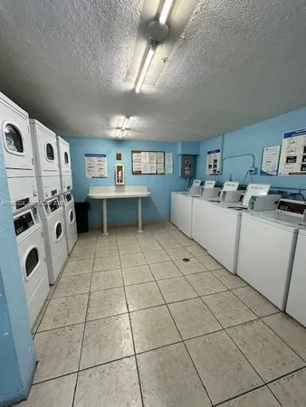 a view of kitchen with furniture and window