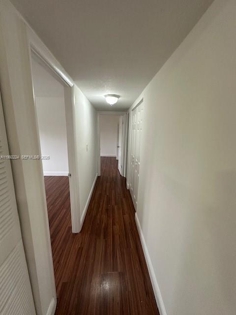 5400 Southwest 77th Court, Unit 2R Miami, FL 33155 - Photo 9 of 16 a view of entryway with wooden floor