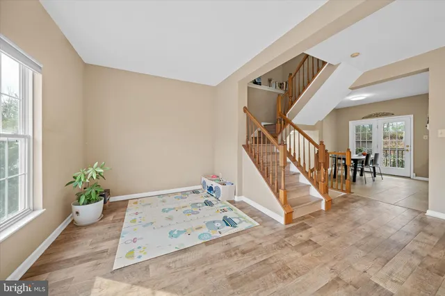 a kitchen with granite countertop cabinets stainless steel appliances and a counter top space