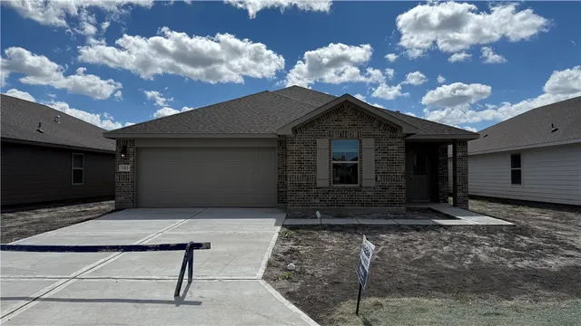 a front view of house with yard