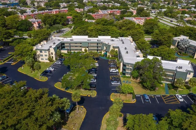 an aerial view of house with yard