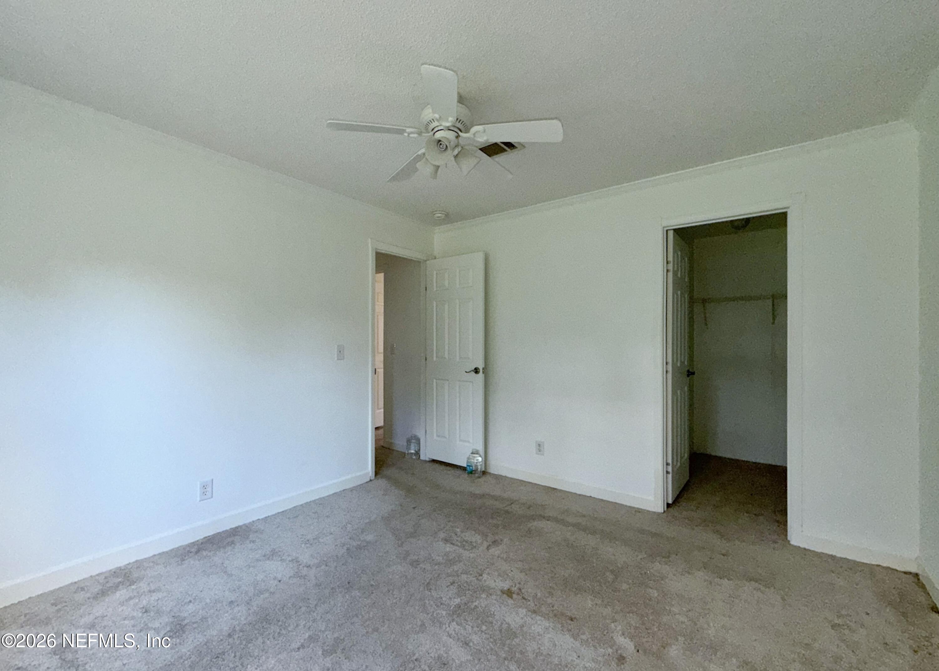 136 Short Pine Road Hawthorne, FL 32640 - Photo 21 of 39 an empty room with a view of a bathroom