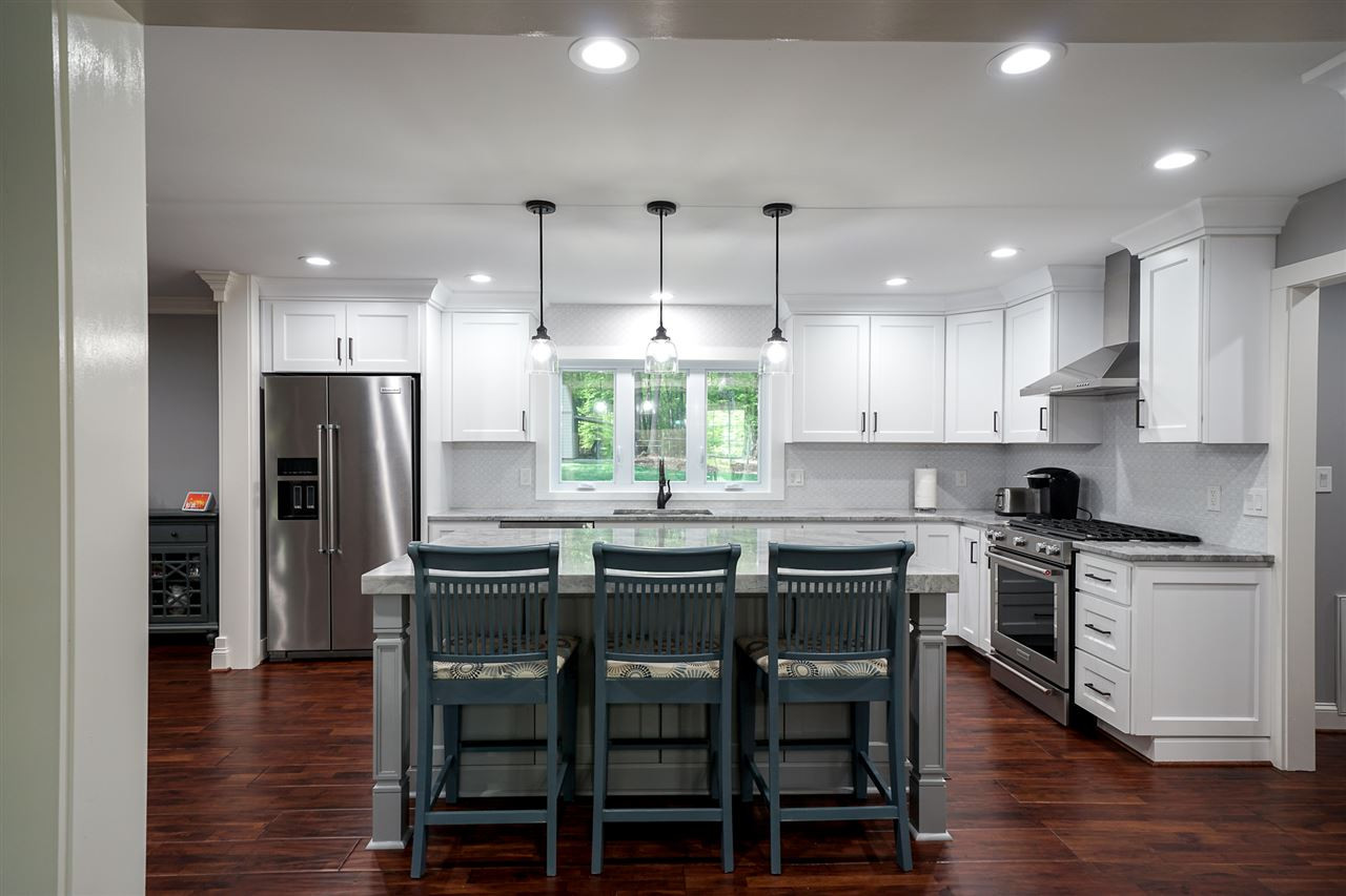 10100 Touchwood Place Raleigh, NC 27613 - Photo 4 of 26 Island, great work surface plus kitchen dining. Kitchen