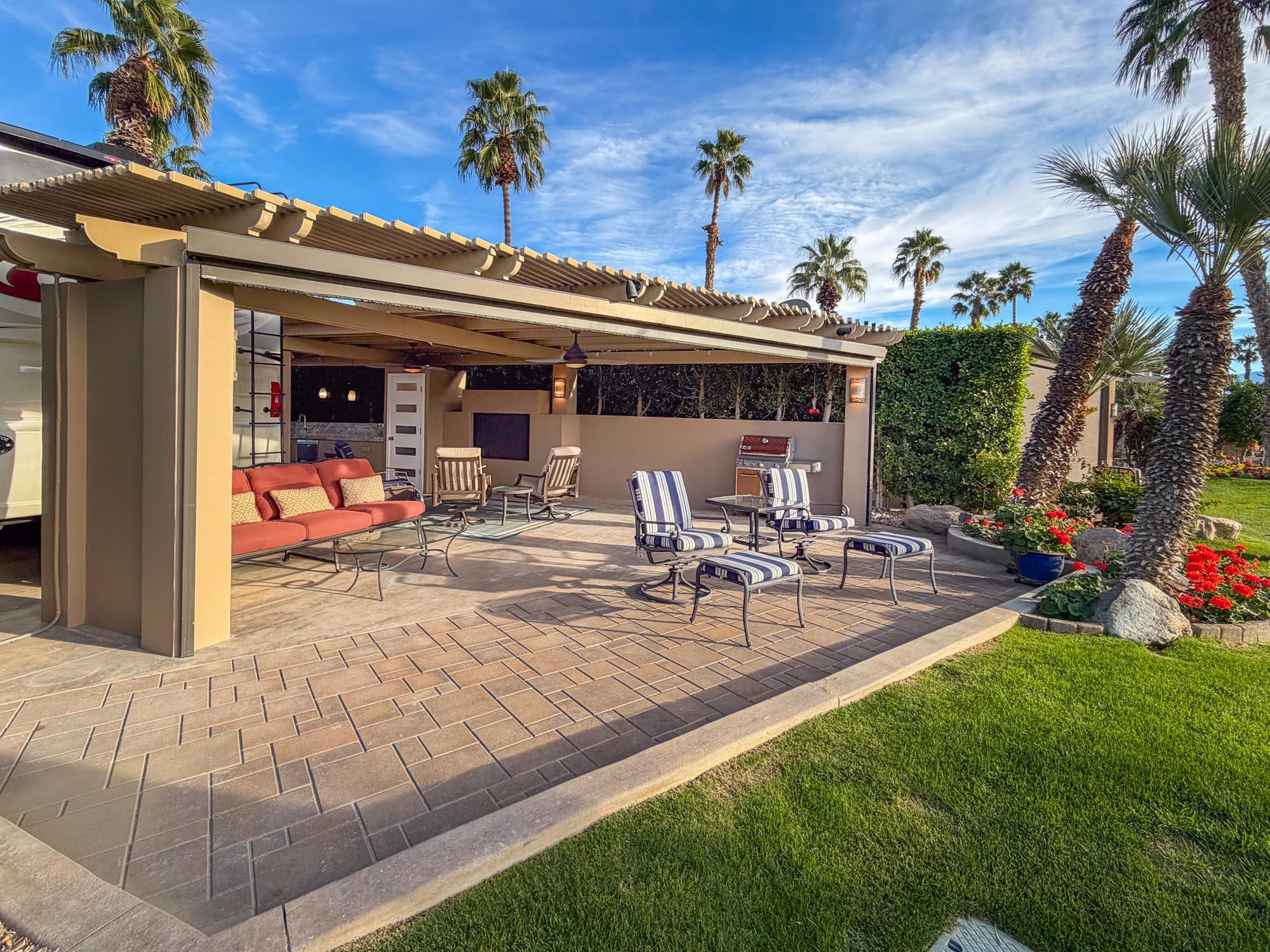 80394 Ave 48, Unit 298 Indio, CA 92201 - Photo 12 of 25 a view of a backyard with a patio