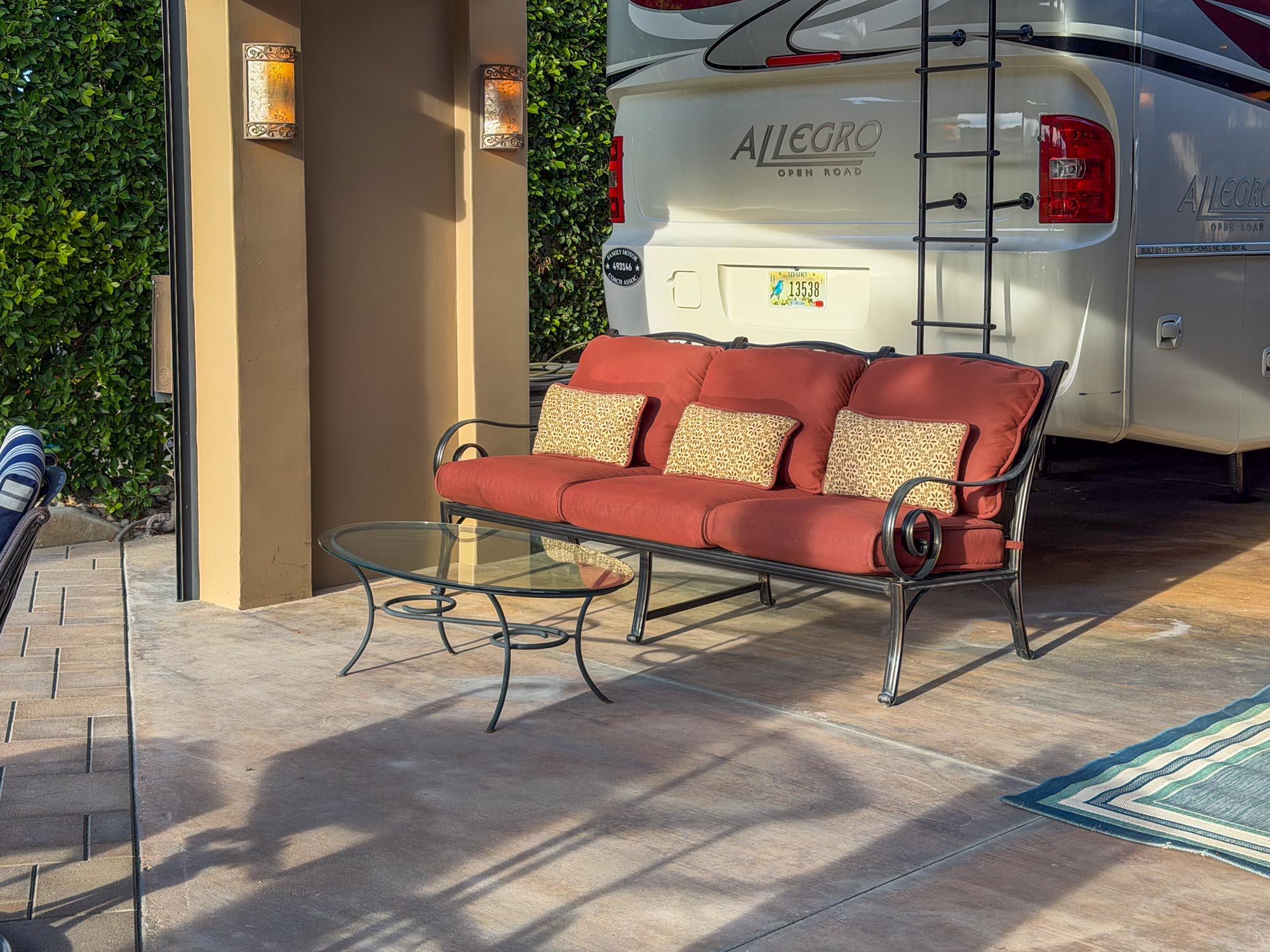 80394 Ave 48, Unit 298 Indio, CA 92201 - Photo 17 of 25 a building outdoor space with patio furniture and potted plants