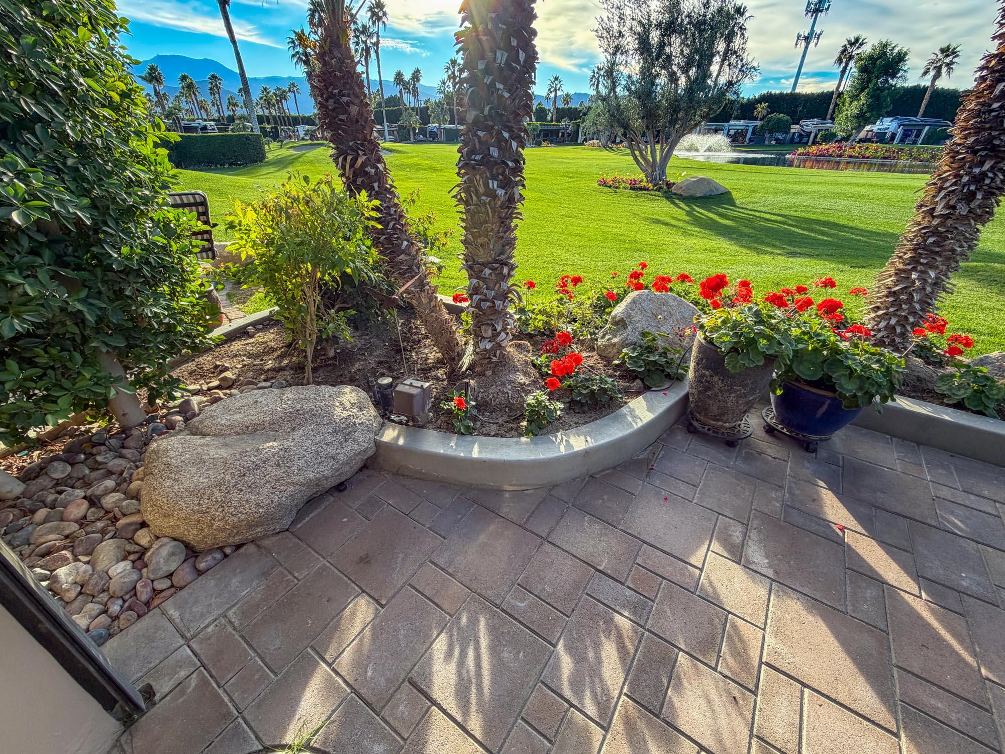 80394 Ave 48, Unit 298 Indio, CA 92201 - Photo 10 of 25 a view of a backyard with garden