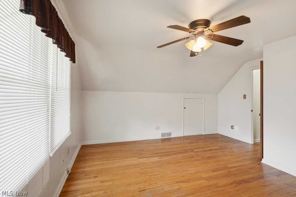 161 Pinehurst Road Munroe Falls, OH 44262 - Photo 24 of 40 Spacious room featuring wood-finish flooring, a ceiling fan with integrated lighting, and a window with blinds