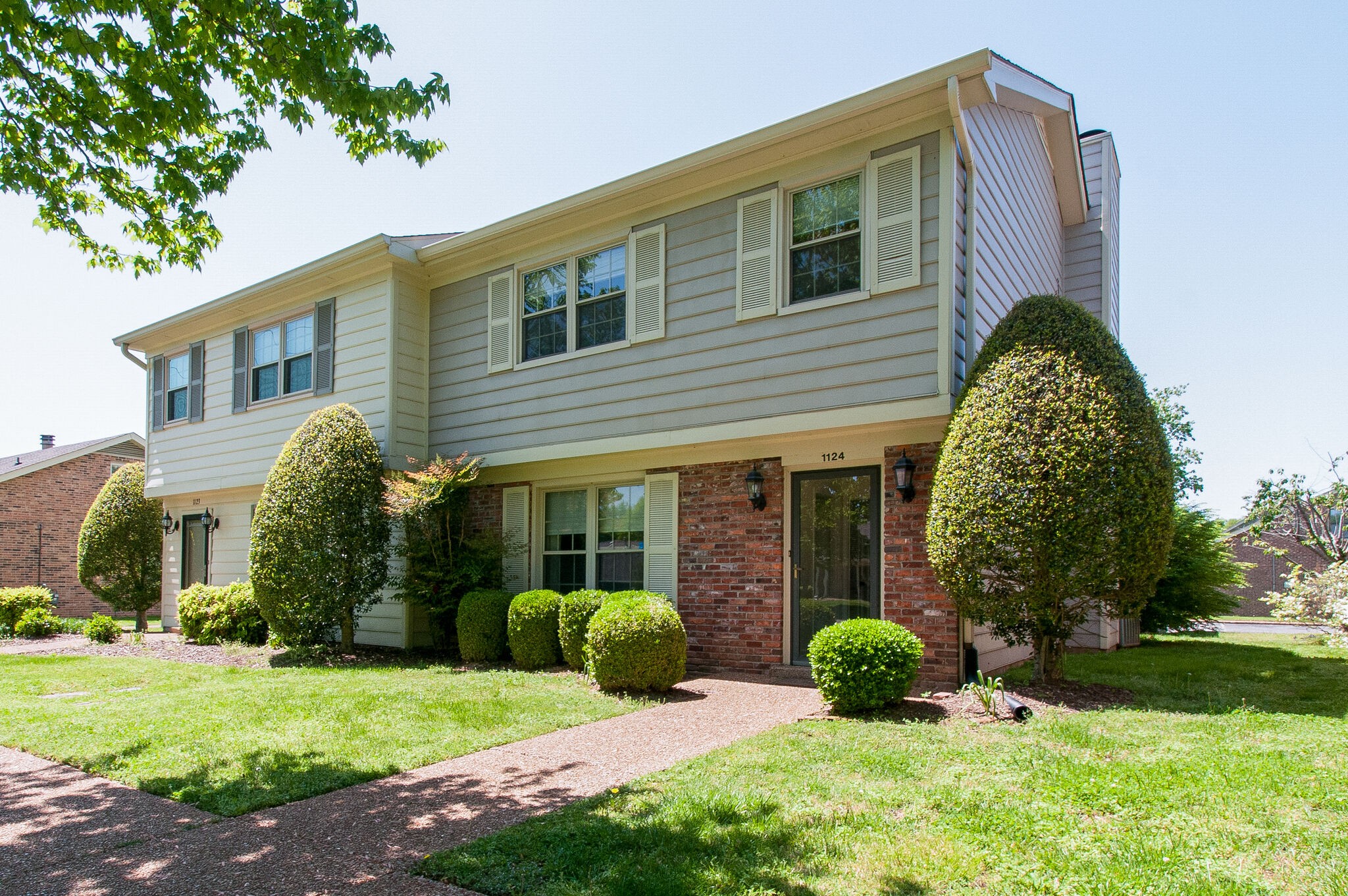 1124 General George Patton Road Nashville, TN 37221 - Photo 3 of 25 a view of a house with a yard and plants