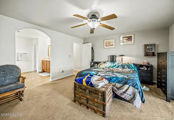 a en suite bathroom with a double sink and mirror