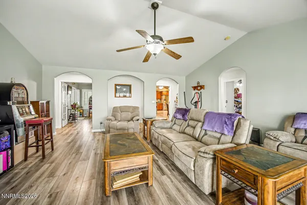 a kitchen with stainless steel appliances a sink stove and cabinets