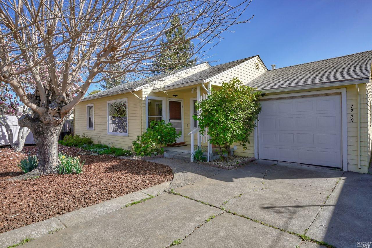 1730 Beaver Street Santa Rosa, CA 95404 - Photo 1 of 1 a front view of a house with garden