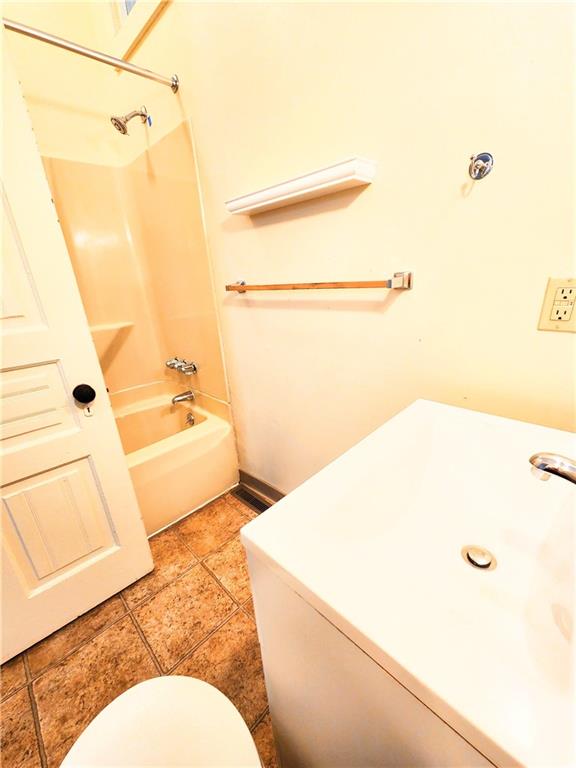 613 Ivy Street, Unit 1 Pittsburgh, PA 15232 - Photo 4 of 6 a bathroom with a sink and a mirror
