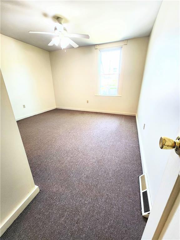 613 Ivy Street, Unit 1 Pittsburgh, PA 15232 - Photo 5 of 6 an empty room with a window