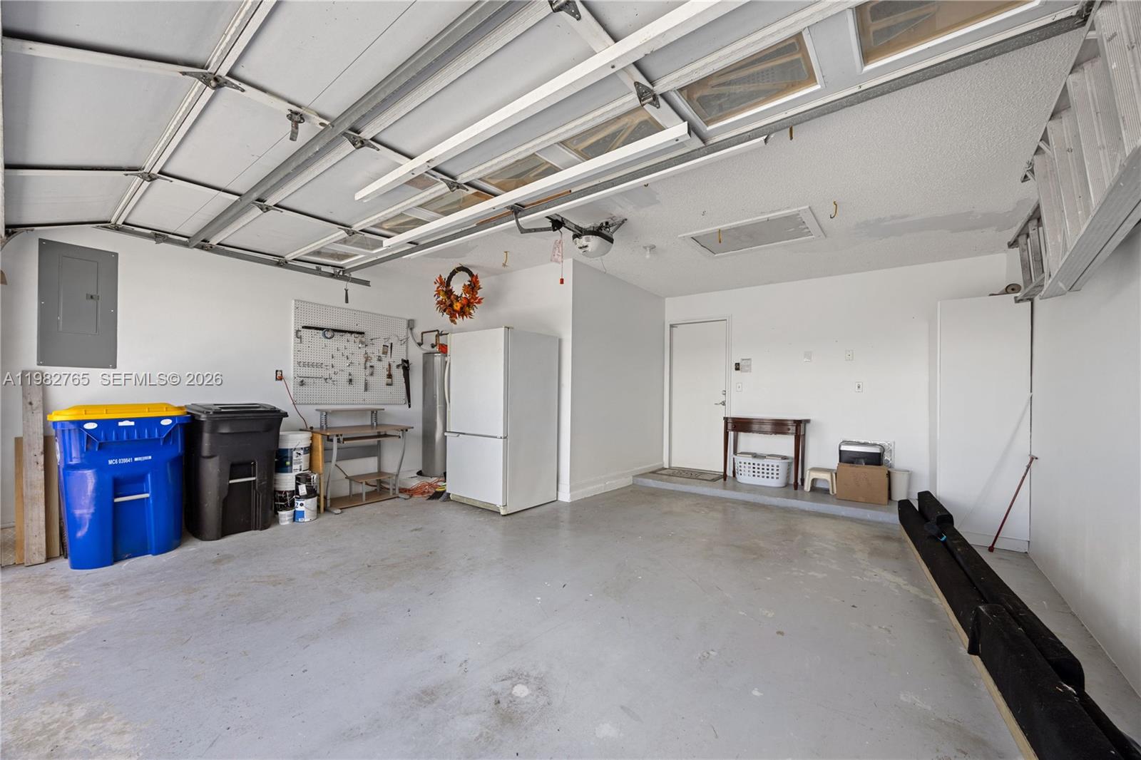 8962 Southeast Riverfront Terrace Jupiter, FL 33469 - Photo 18 of 20 a view of a garage