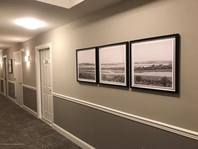 a balcony with furniture and a fireplace