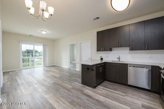 2 Henessey Boulevard, Unit 304 Atlantic Highlands, NJ 07716 - Photo 3 of 19 a kitchen with stainless steel appliances granite countertop a sink dishwasher a stove and a microwave oven on granite countertops