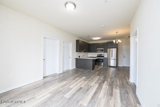 2 Henessey Boulevard, Unit 304 Atlantic Highlands, NJ 07716 - Photo 7 of 19 a view of kitchen with wooden floor