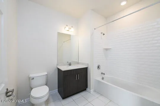 a bathroom with a toilet a sink and bathtub
