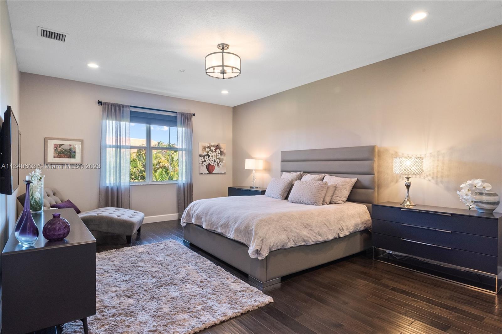 22936 Clear Echo Drive, Unit 34 Boca Raton, FL 33433 - Photo 19 of 41 a bedroom with a bed and a couch