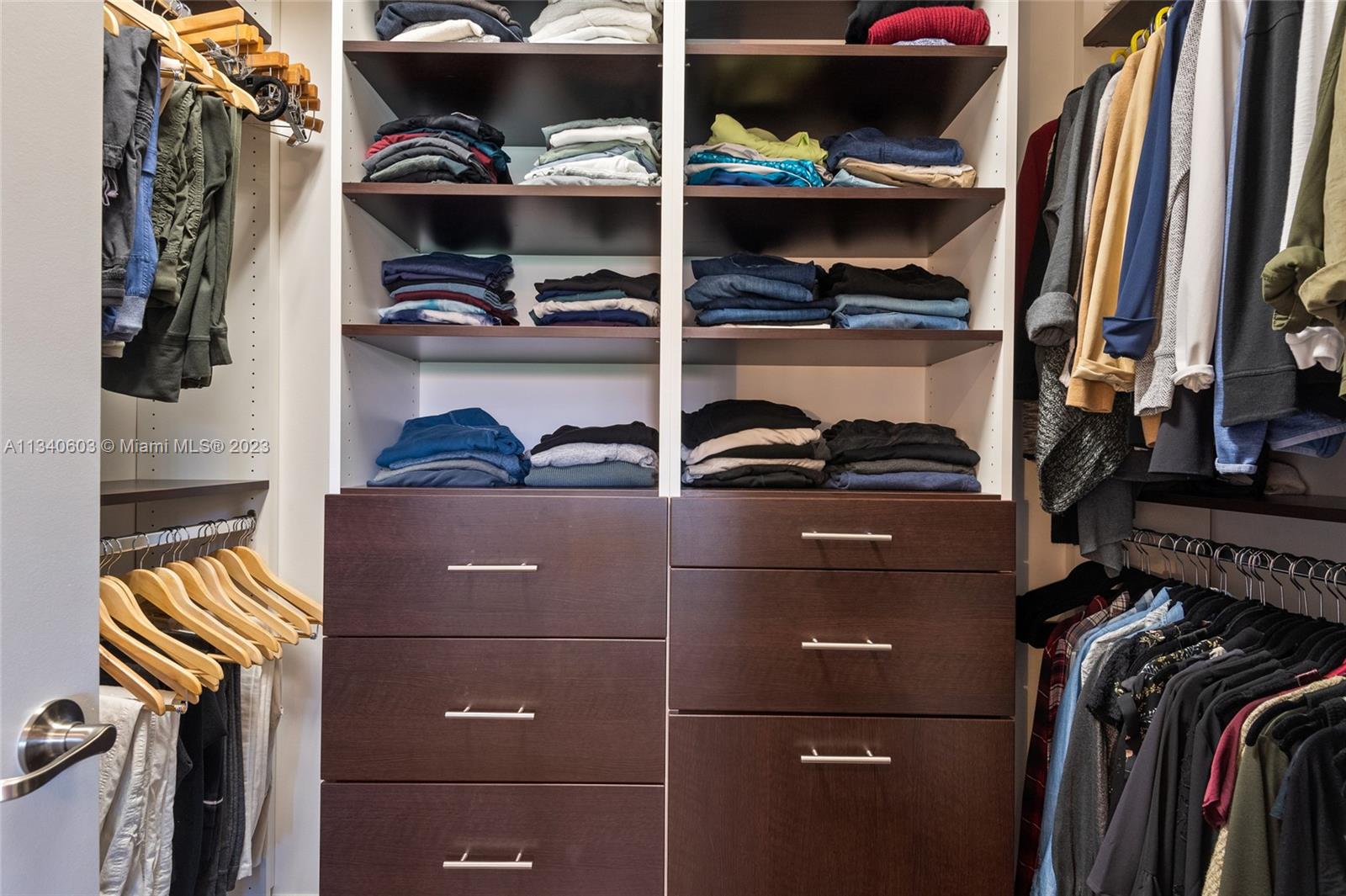 22936 Clear Echo Drive, Unit 34 Boca Raton, FL 33433 - Photo 21 of 41 a view of walk in closet with clothes and shoes
