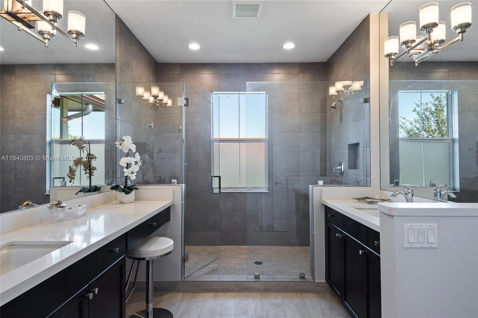 22936 Clear Echo Drive, Unit 34 Boca Raton, FL 33433 - Photo 23 of 41 a bathroom with a sink double vanity and a mirror