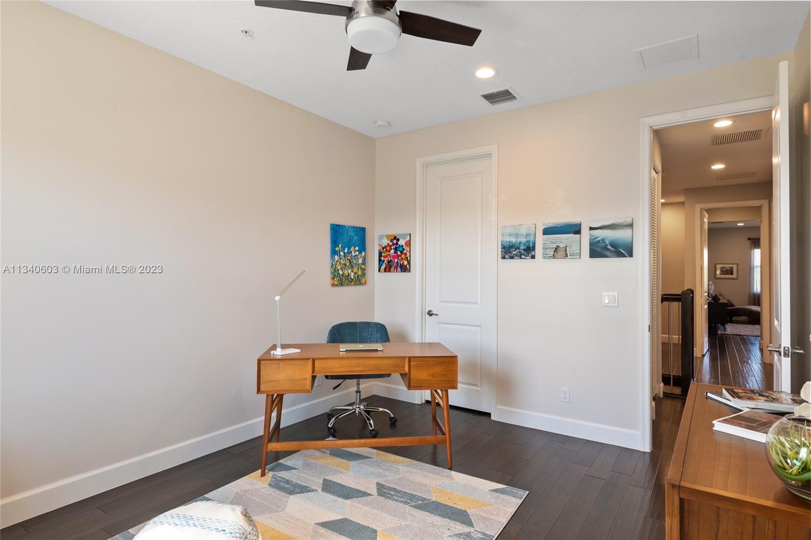 22936 Clear Echo Drive, Unit 34 Boca Raton, FL 33433 - Photo 26 of 41 a room with furniture and gym equipment