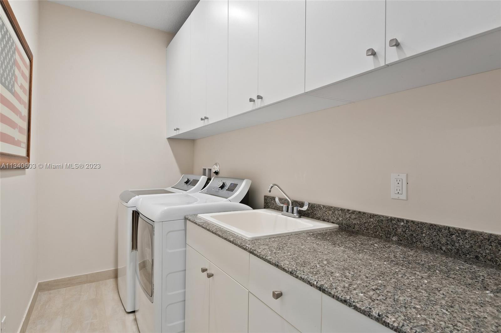 22936 Clear Echo Drive, Unit 34 Boca Raton, FL 33433 - Photo 30 of 41 a bathroom with a sink and vanity