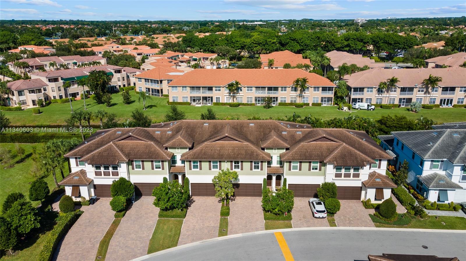 22936 Clear Echo Drive, Unit 34 Boca Raton, FL 33433 - Photo 34 of 41 an aerial view of multiple houses with a yard