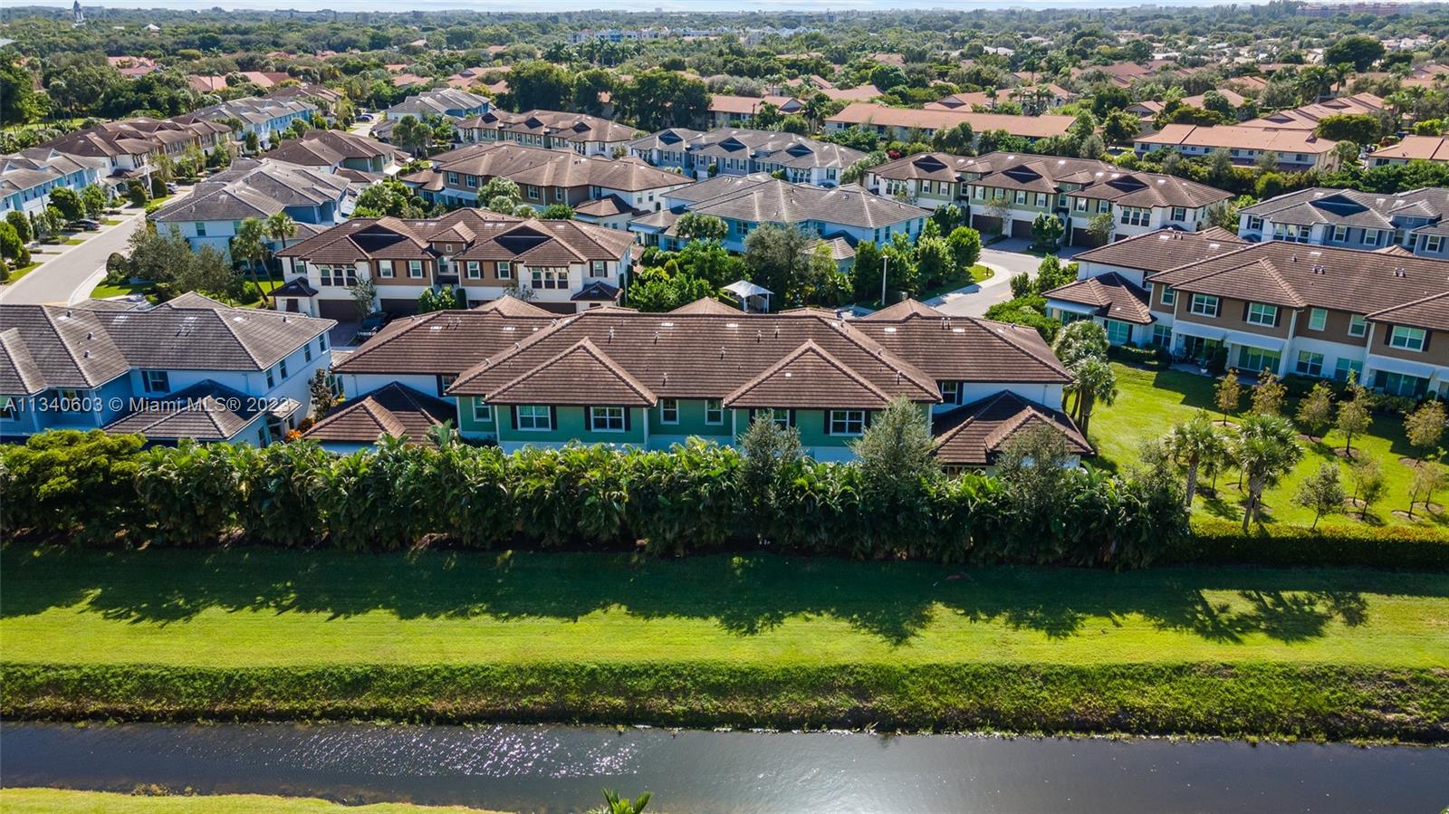 22936 Clear Echo Drive, Unit 34 Boca Raton, FL 33433 - Photo 36 of 41 an aerial view of residential houses with outdoor space and lake view