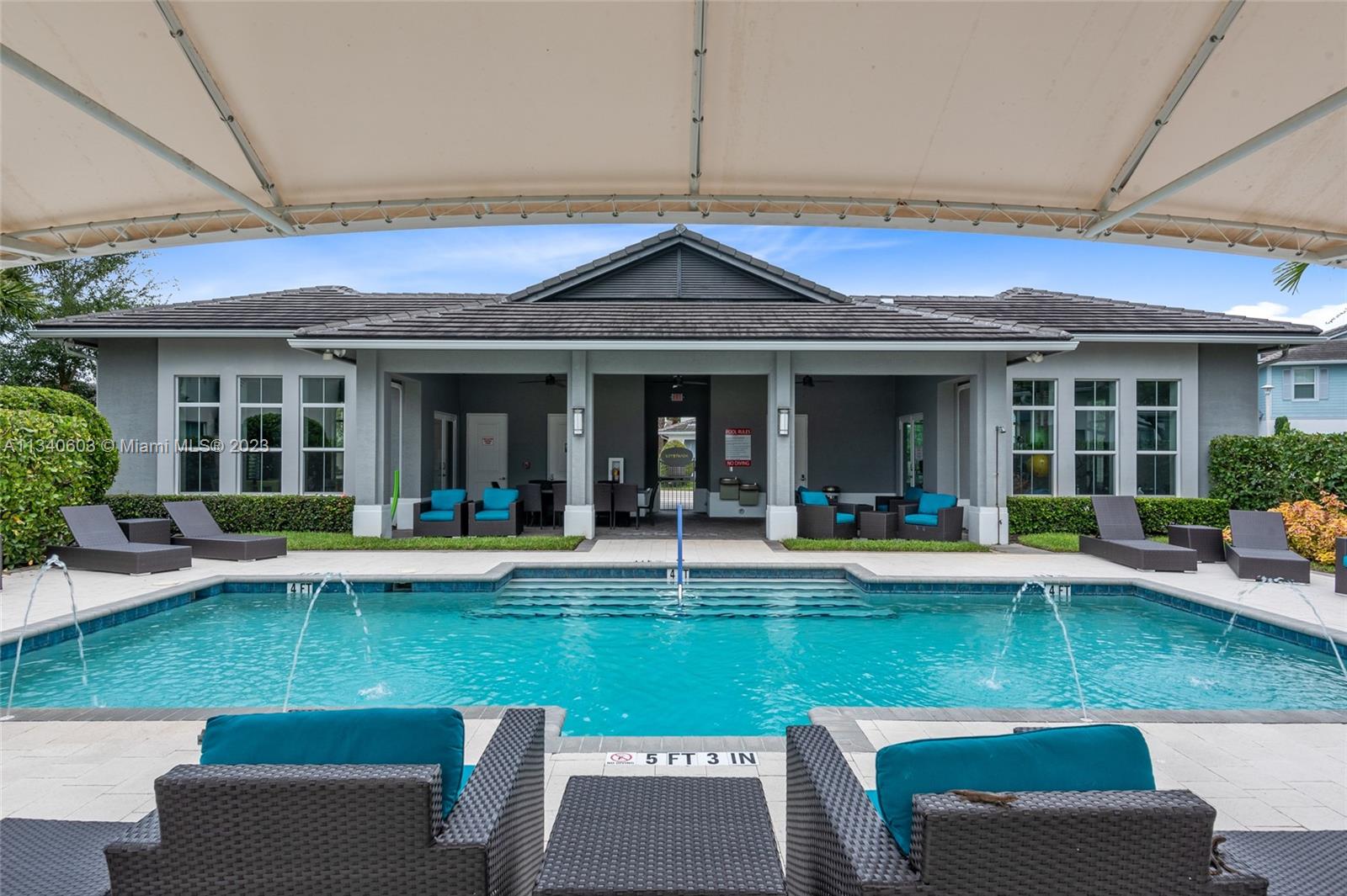 22936 Clear Echo Drive, Unit 34 Boca Raton, FL 33433 - Photo 40 of 41 a view of pool with outdoor seating