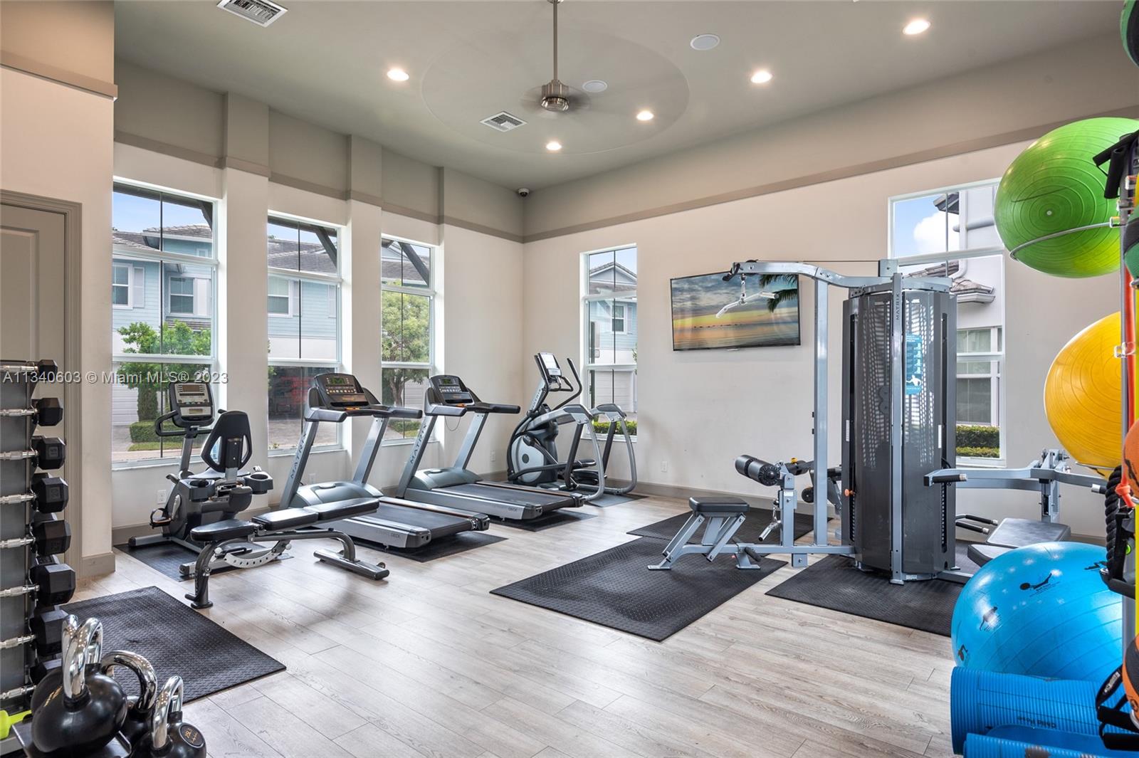 22936 Clear Echo Drive, Unit 34 Boca Raton, FL 33433 - Photo 41 of 41 a view of a room with gym equipment