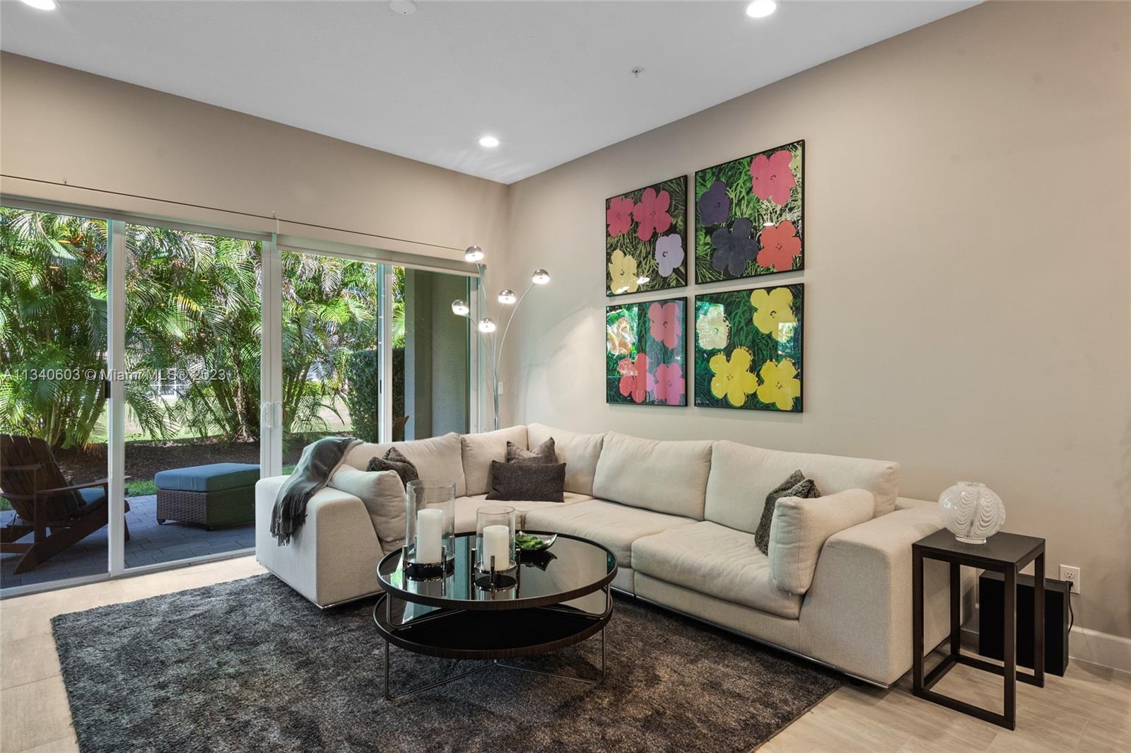 22936 Clear Echo Drive, Unit 34 Boca Raton, FL 33433 - Photo 8 of 41 a living room with furniture and a large window