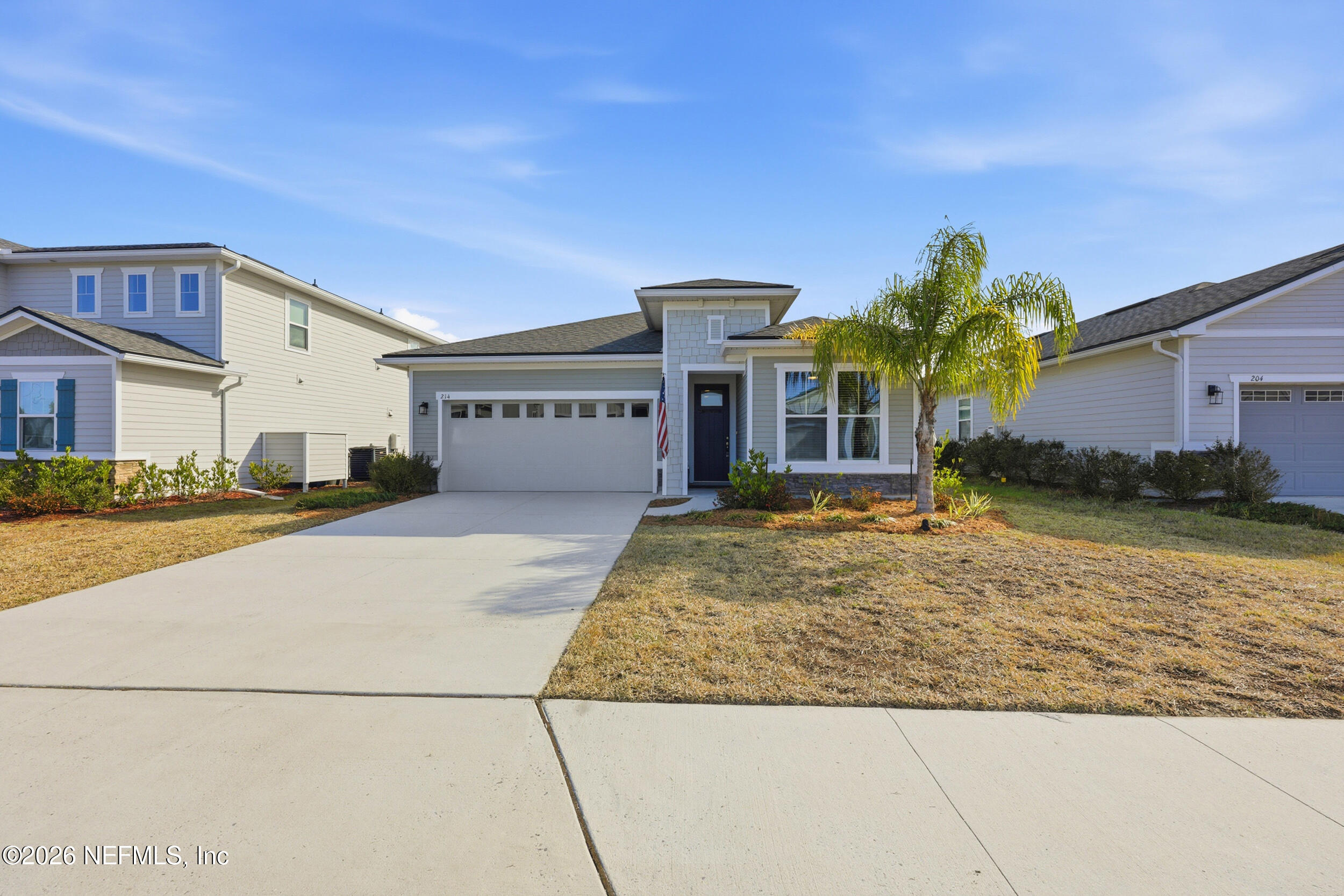 214 Pepperpike Way St. Augustine, FL 32092 - Photo 17 of 63 a front view of a house with a yard