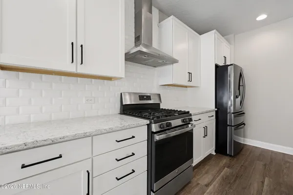 a view of storage and utility room with washer and dryer