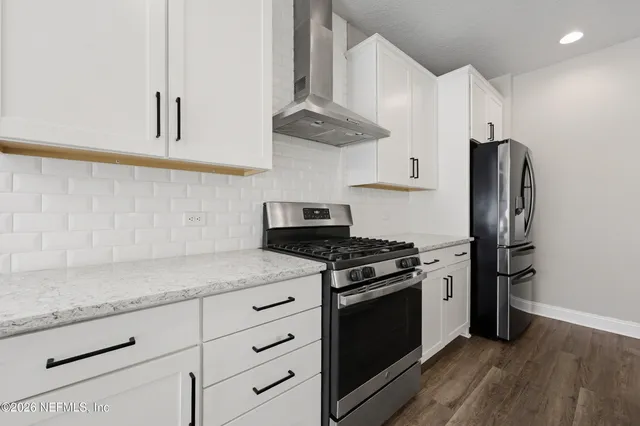 a view of storage and utility room with washer and dryer