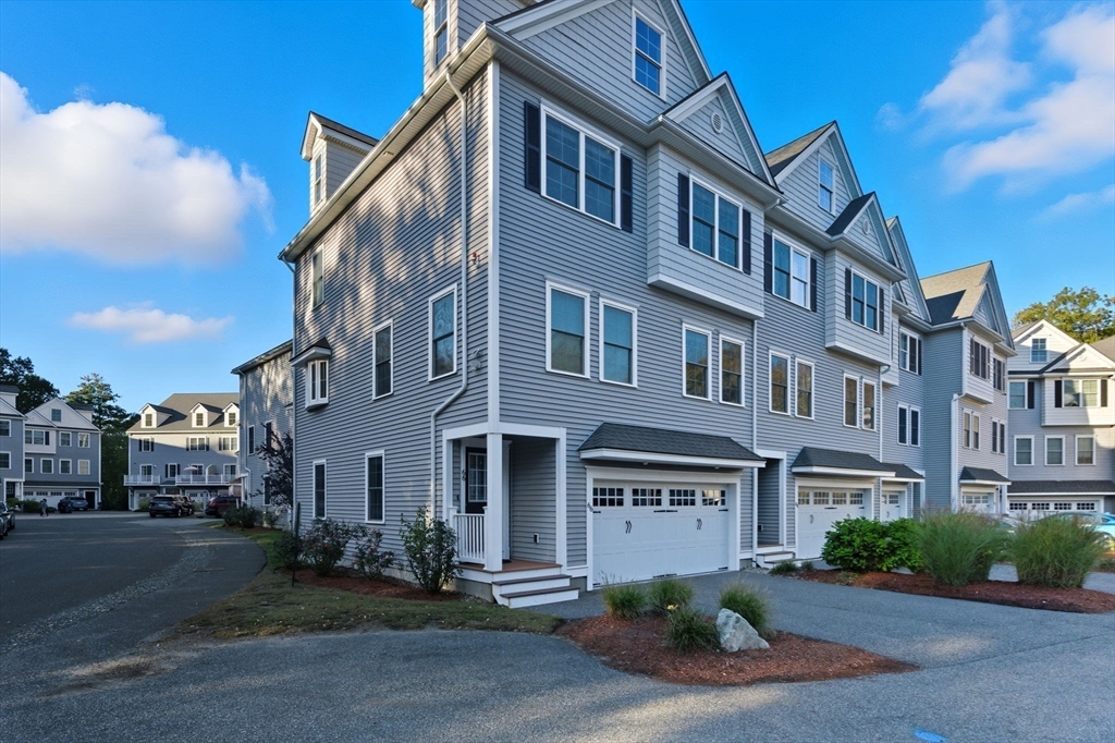 66 Compass Point, Unit 66 North Andover, MA 01845 - Photo 4 of 42 a front view of a building