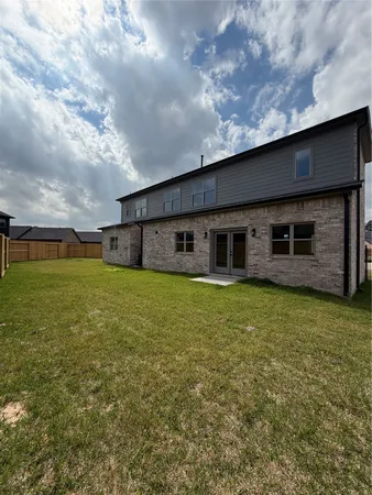 view of a house with a big yard