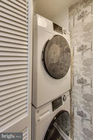 a view of a house with a window and front door