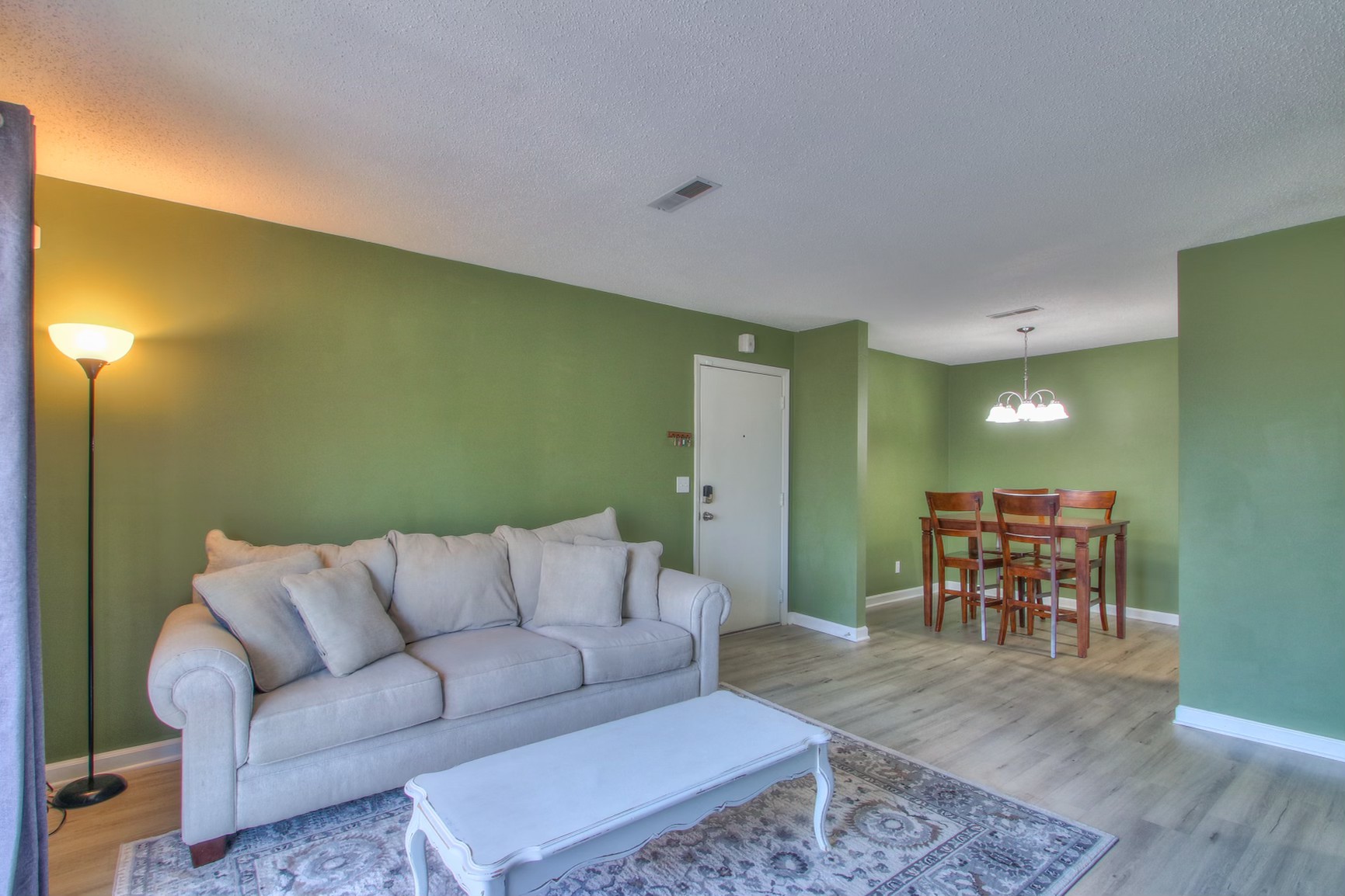 500 Paragon Mills Road, Unit N15 Nashville, TN 37211 - Photo 1 of 20 a living room with furniture and a table