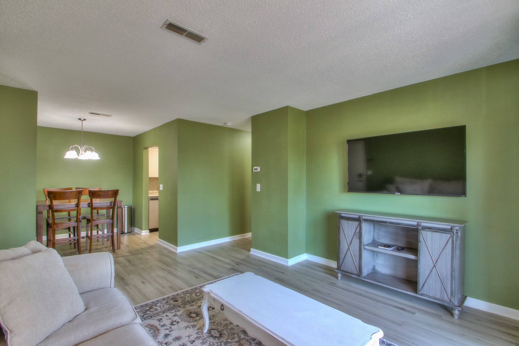 500 Paragon Mills Road, Unit N15 Nashville, TN 37211 - Photo 2 of 20 a living room with furniture and a fireplace
