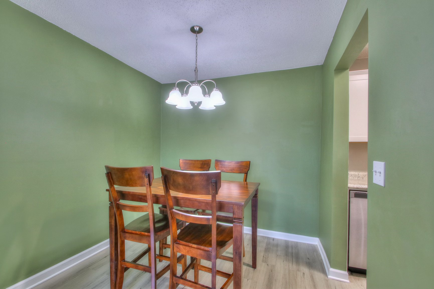 500 Paragon Mills Road, Unit N15 Nashville, TN 37211 - Photo 3 of 20 a view of a dining room with furniture and chandelier