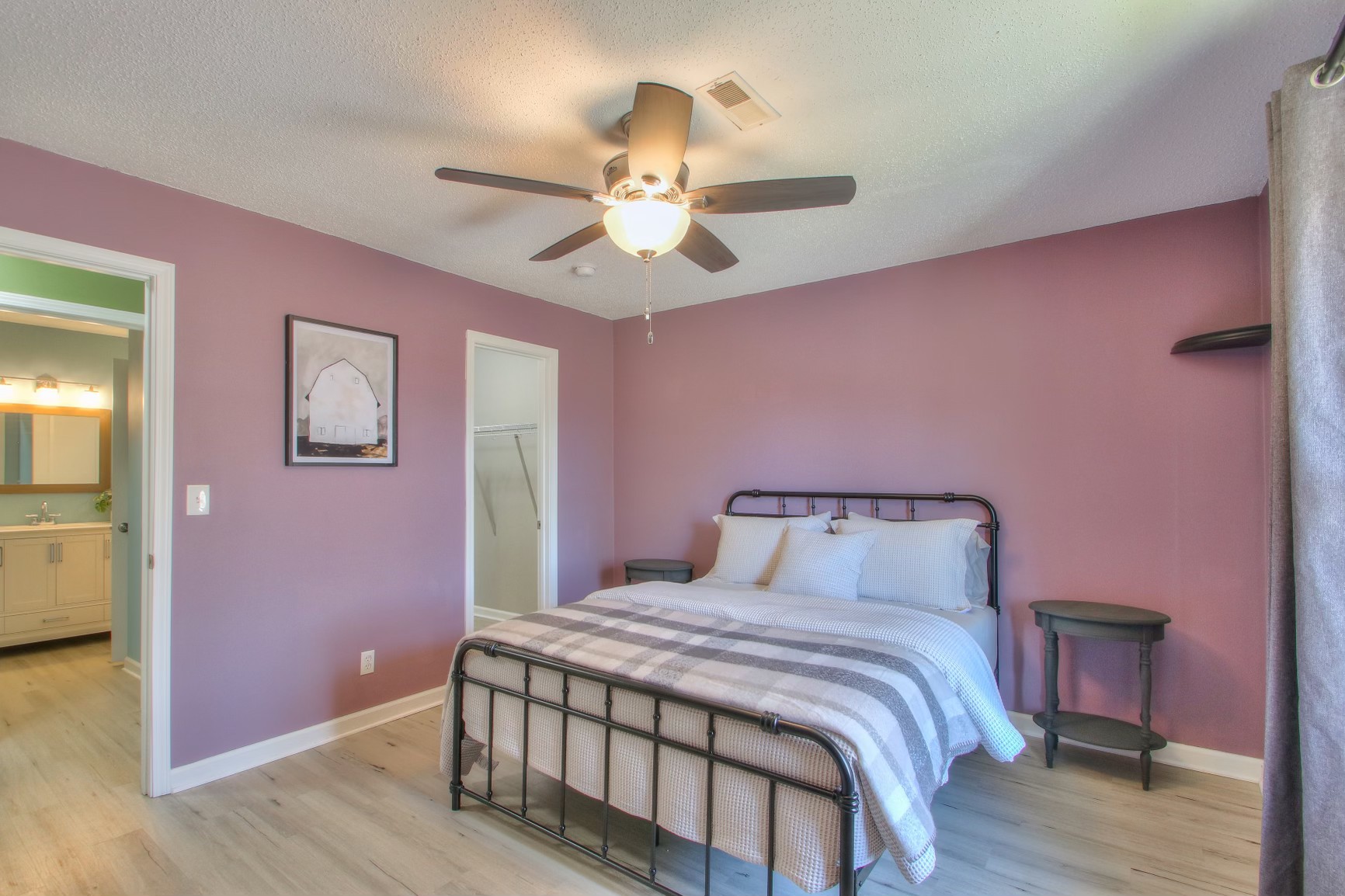 500 Paragon Mills Road, Unit N15 Nashville, TN 37211 - Photo 10 of 20 a bedroom with a bed chandelier and a window