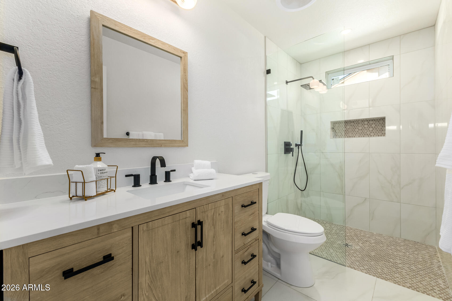 2890 South Mariposa Road Apache Junction, AZ 85119 - Photo 14 of 27 a bathroom with a granite countertop sink mirror toilet and shower