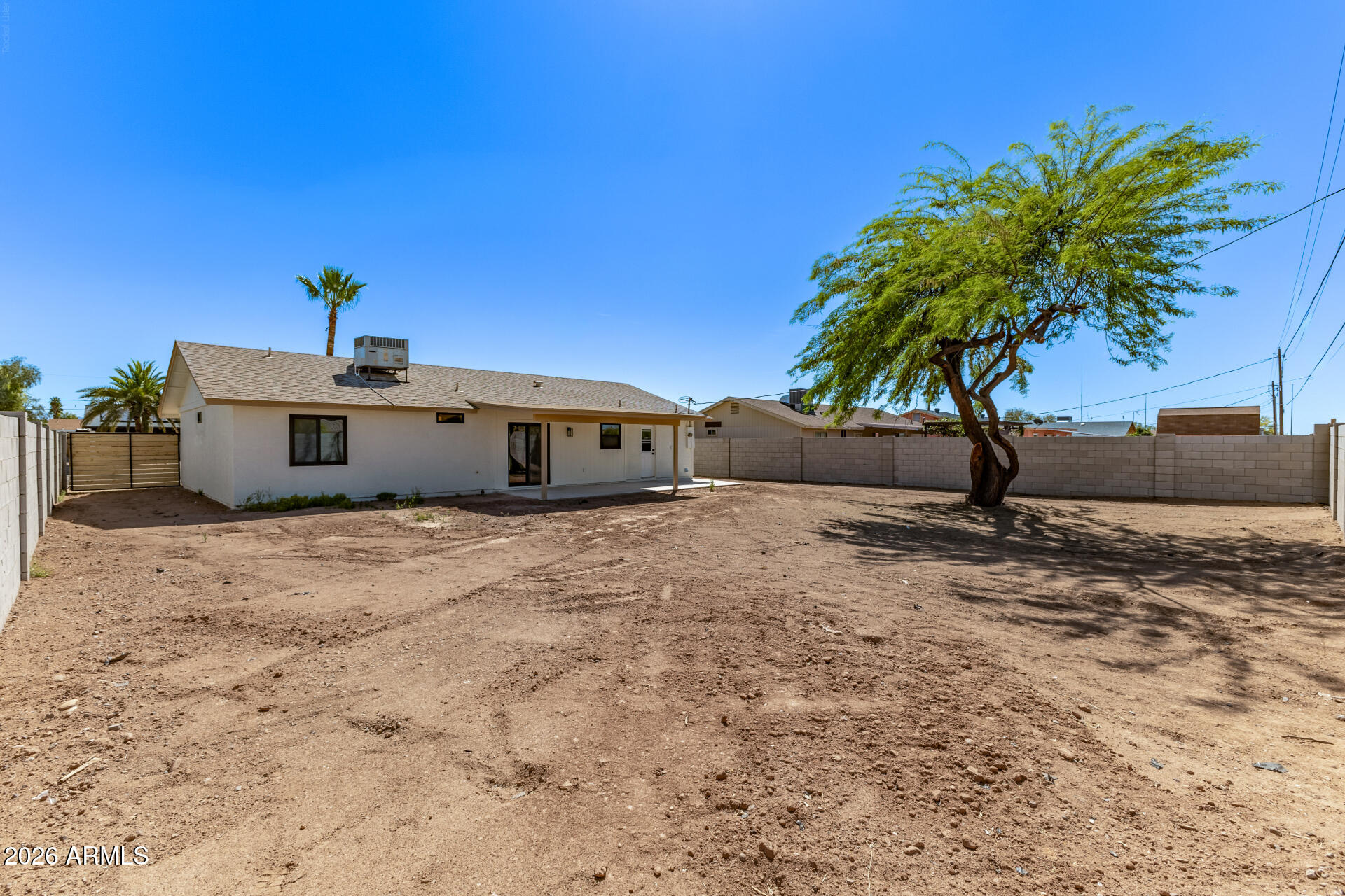2890 South Mariposa Road Apache Junction, AZ 85119 - Photo 25 of 27 a front view of a house with a yard