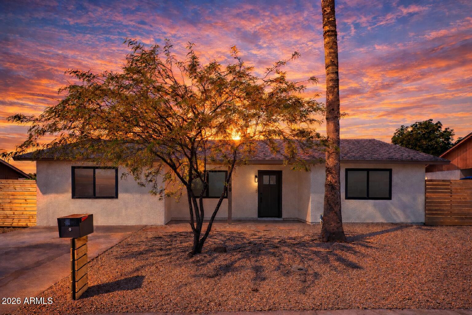 2890 South Mariposa Road Apache Junction, AZ 85119 - Photo 27 of 27 a view of a house with a tree in the background