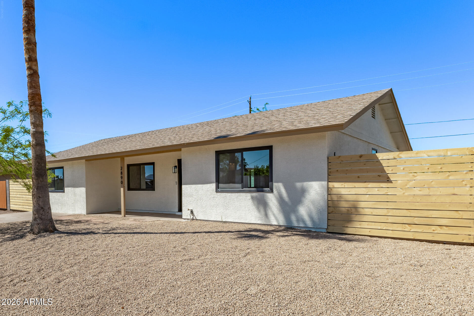 2890 South Mariposa Road Apache Junction, AZ 85119 - Photo 3 of 27 a view of a house with a backyard