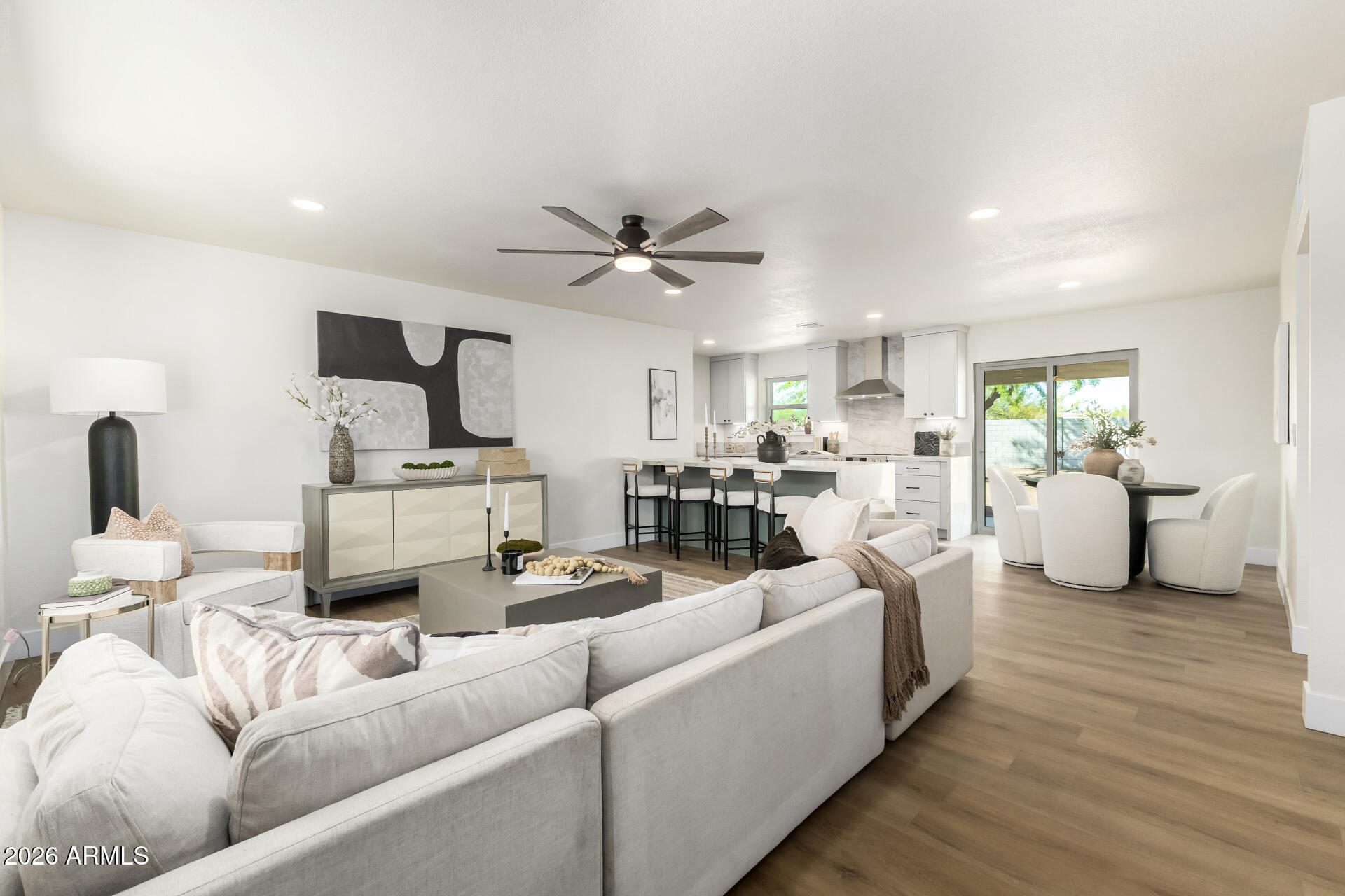 2890 South Mariposa Road Apache Junction, AZ 85119 - Photo 5 of 27 a living room with furniture white walls and white walls