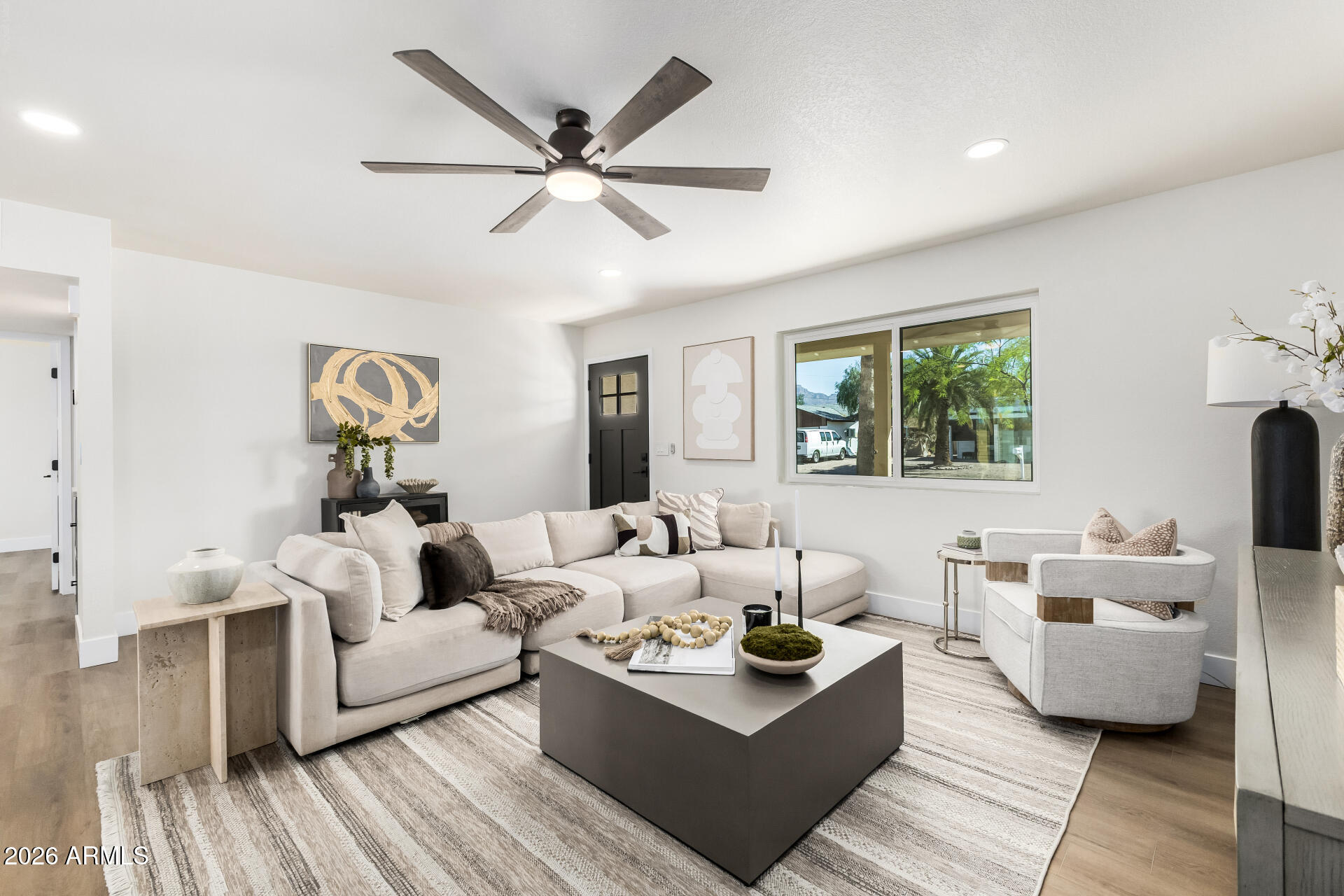 2890 South Mariposa Road Apache Junction, AZ 85119 - Photo 6 of 27 a living room with furniture and a large window